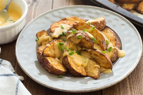 roasted-potato-wedges-with-cheddar-sauce-bothwell image