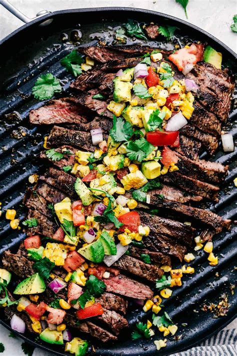 grilled-garlic-herb-flank-steak-with-avocado-corn image