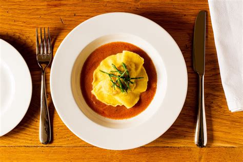 crab-ravioli-with-lobster-bisque-the-nosey-chef image
