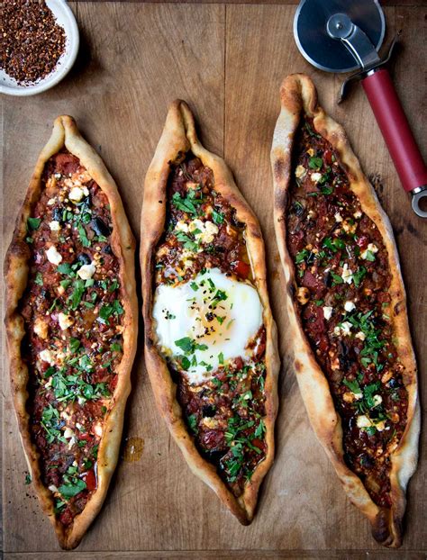 vegetarian-turkish-pide-flatbread-wild-greens-sardines image