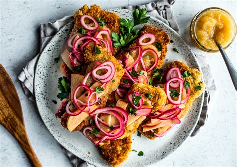 pork-schnitzel-with-quick-pickled-onions-and-apples image