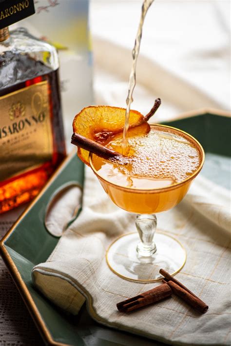 spiced-pear-martini-with-amaretto-and-cardamom-bitters image