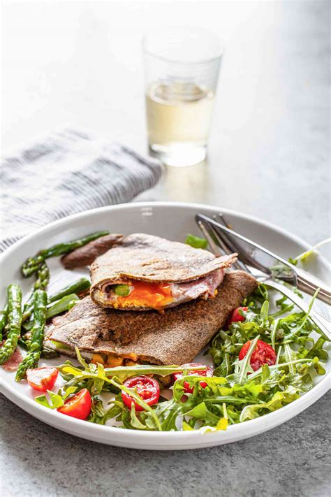 buckwheat-crepes-with-egg-ham-cheese-and-asparagus image