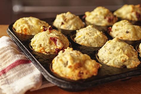 savory-olive-and-sun-dried-tomato-muffins image