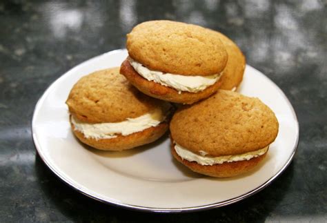 pumpkin-sandwich-cookies-with-cream-cheese-filling image