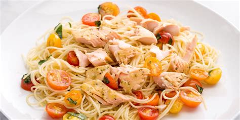 garlicky-angel-hair-with-salmon-and-tomatoes-delish image