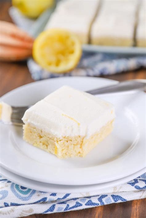 frosted-lemon-sour-cream-cookie-bars-a-kitchen image