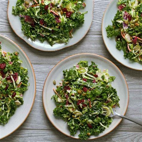 kale-salad-with-creamy-poppy-seed-dressing-eatingwell image