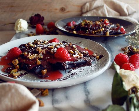 dark-chocolate-ravioli-with-ricotta-filling-raspberry image
