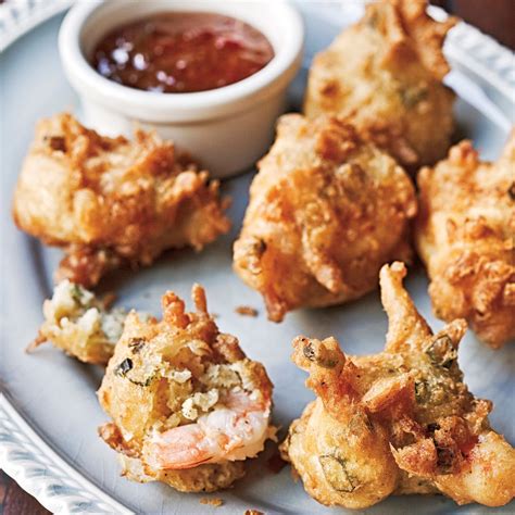 coconut-shrimp-beignets-with-pepper-jelly-sauce image
