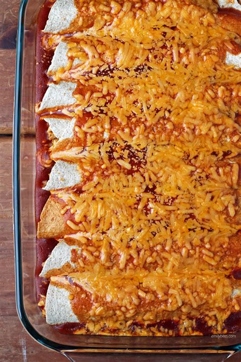 easy-chicken-and-bean-enchiladas-emily-bites image