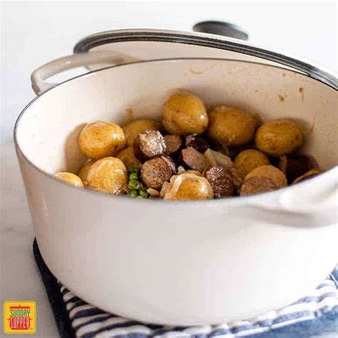smothered-potatoes-and-sausage-sunday-supper image