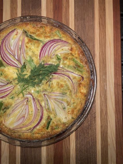 goat-cheese-and-dill-quiche-in-a-hash-brown-crust image