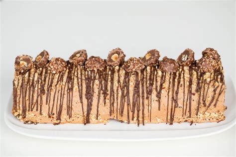 hazelnut-log-cake-ferrero-rocher-inspired-momsdish image