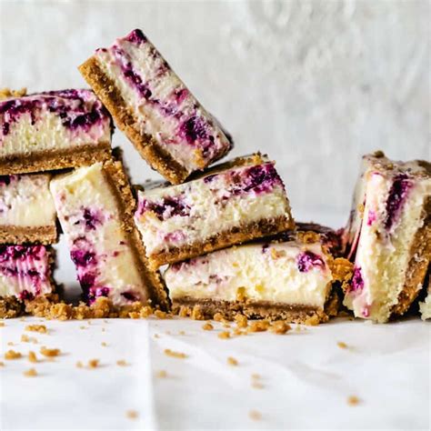 mixed-berry-cheesecake-bars-the-frozen-biscuit image