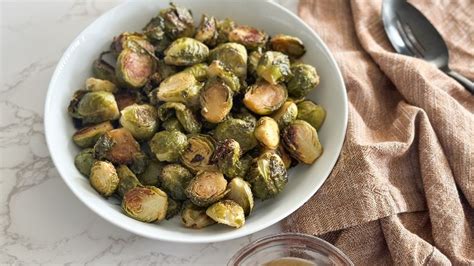 maple-dijon-brussels-sprouts-recipe-the-daily-meal image