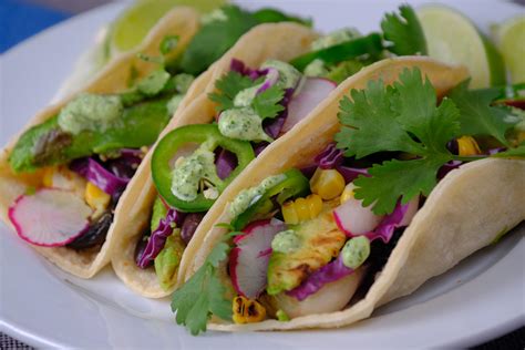 grilled-avocado-and-vegetable-tacos-meatless image