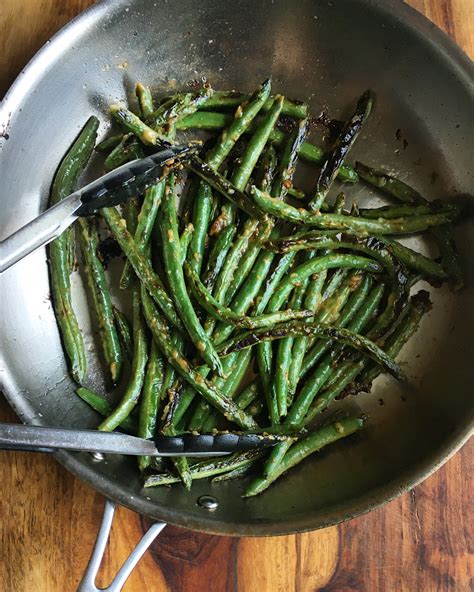 blistered-green-beans-with-garlicky-miso-lime-sauce image