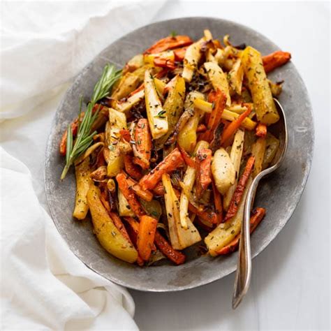 the-best-oven-roasted-carrots-and-parsnips-garlic image