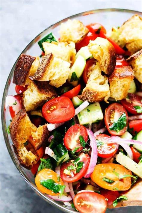 summer-panzanella-with-garlic-butter-bread-eating image