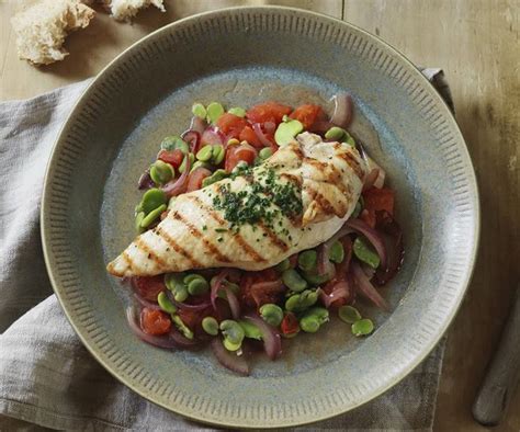 char-grilled-chicken-with-broad-beans-and-chive-butter image
