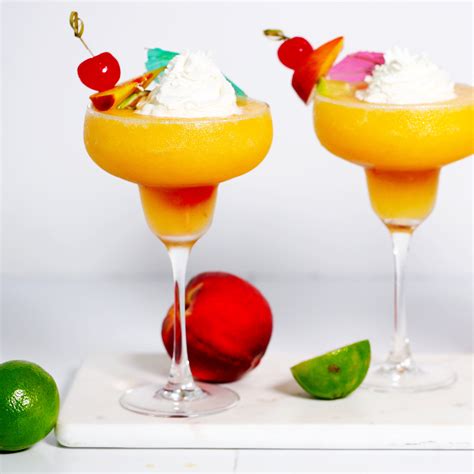 peach-daiquiri-easy-frozen-cocktail-the-anthony-kitchen image