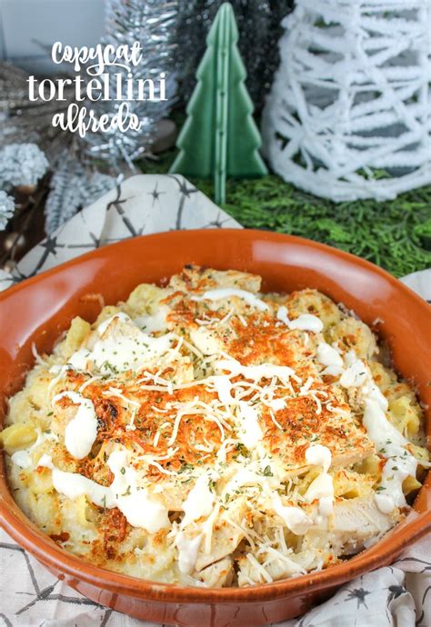 asiago-tortelloni-alfredo-with-grilled-chicken-the-food image