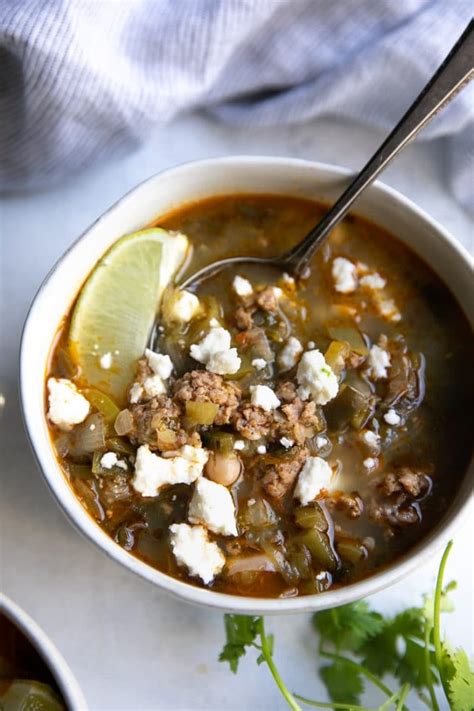 pork-green-chili-recipe-with-white-beans-the-forked image