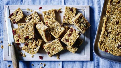 cranberry-and-coconut-cereal-bars-recipe-bbc-food image