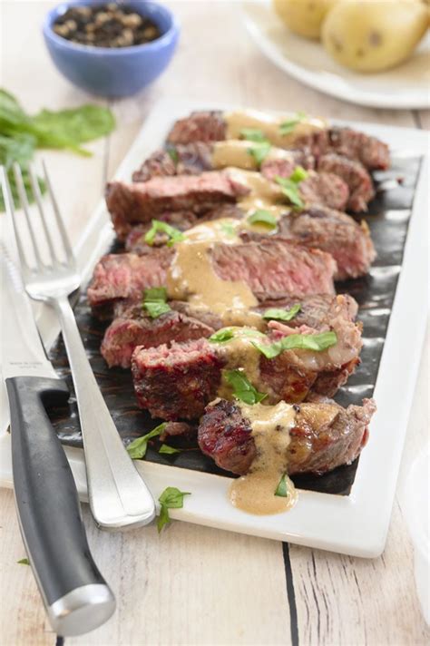 grilled-ribeye-steak-with-onion-blue-cheese-sauce image
