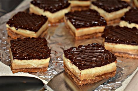 dulce-de-leche-cheesecake-bars-served-with-a image