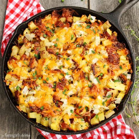 cheesy-grilled-skillet-potatoes-with-bacon-and-herbs image