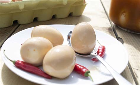 cajun-pickled-eggs-pepperscale image