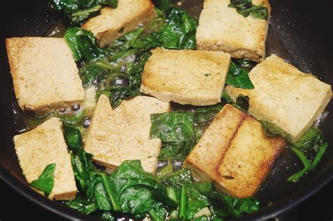 marinated-tofu-with-stir-fry-spinach-recipe-the-spruce image