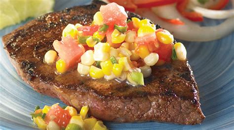 chili-rubbed-sirloin-steaks-with-sweet-corn-relish image