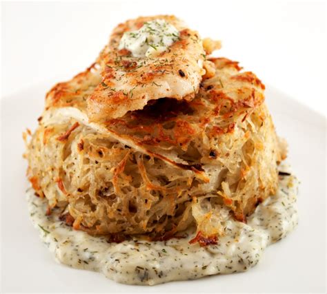 fried-walleye-potato-cakes-with-creamy-dill-sauce image