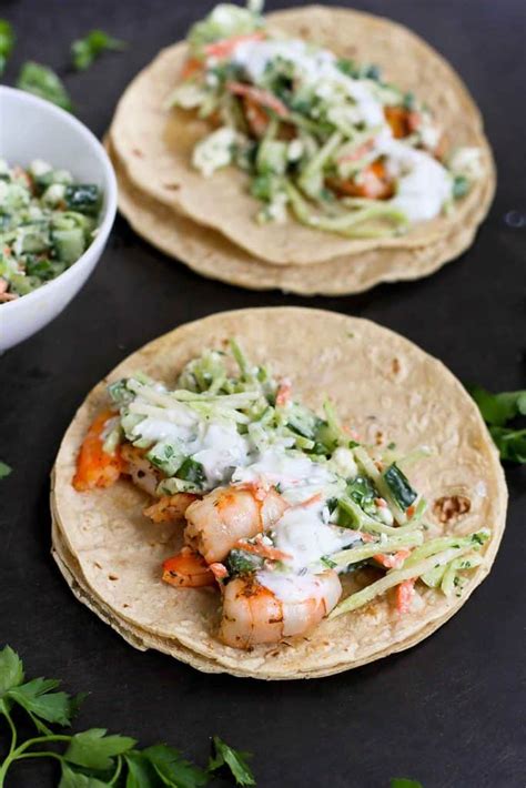 greek-shrimp-tacos-recipe-with-feta-broccoli-slaw image