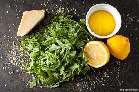 baby-arugula-salad-lemon-vinaigrette-recipe-salt image