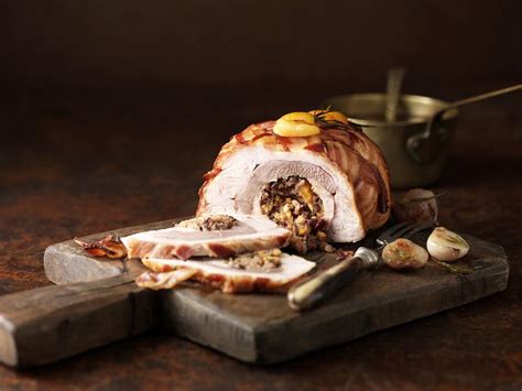 cornbread-stuffed-pork-loin-recipe-the-spruce-eats image