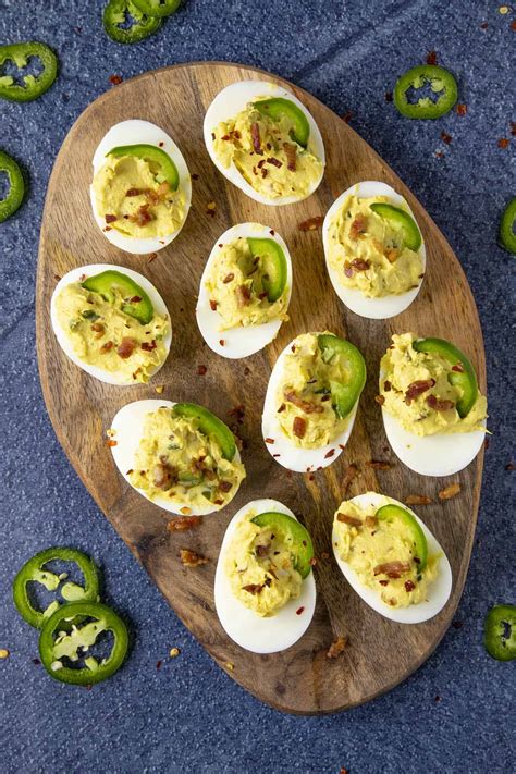 spicy-deviled-eggs-with-bacon-and-jalapeno-chili image