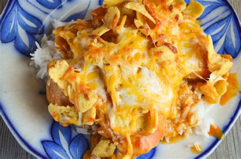 cheesy-mexican-chicken-recipe-topped-with-corn-chips image