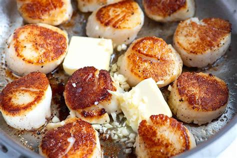 seared-scallops-with-garlic-basil-butter-inspired-taste image