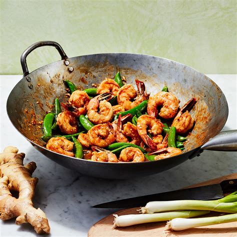 stir-fried-shrimp-sugar-snap-peas-eatingwell image