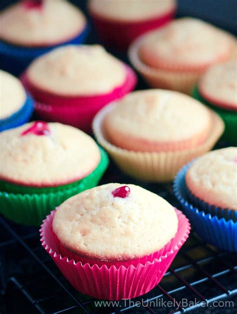white-chocolate-cupcakes-with-raspberry-filling-the image