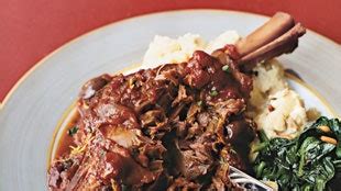 braised-lamb-shanks-with-olives-lemon-and-tomatoes image