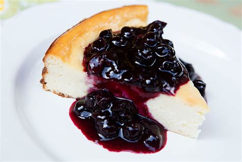 lemon-ricotta-cheesecake-with-blueberry-sauce image