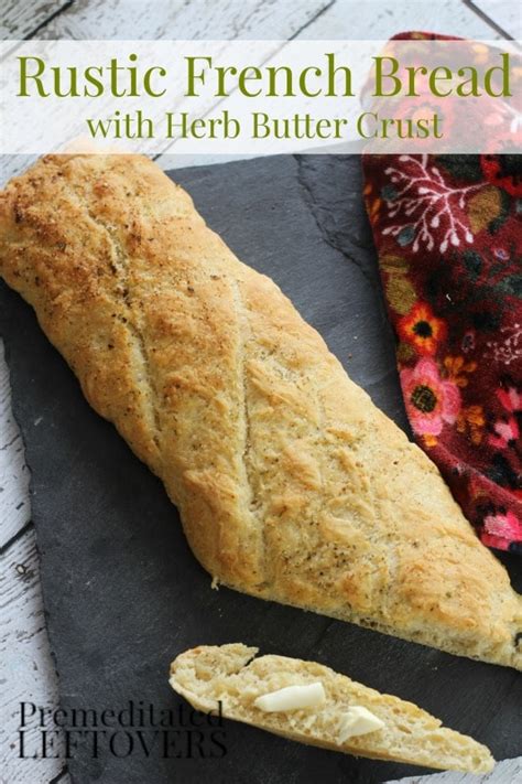 rustic-homemade-french-bread-with-herb-butter-crust image