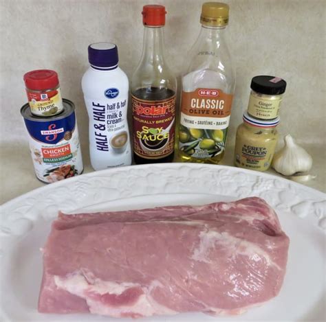 pork-loin-roast-with-dijon-mustard-glaze-and-sauce image