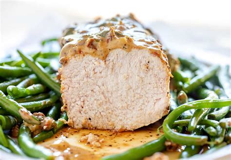pork-loin-with-roasted-garlic-cream-sauce-i-am-baker image