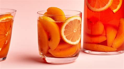 peach-aperol-spritz-recipe-bon-apptit image